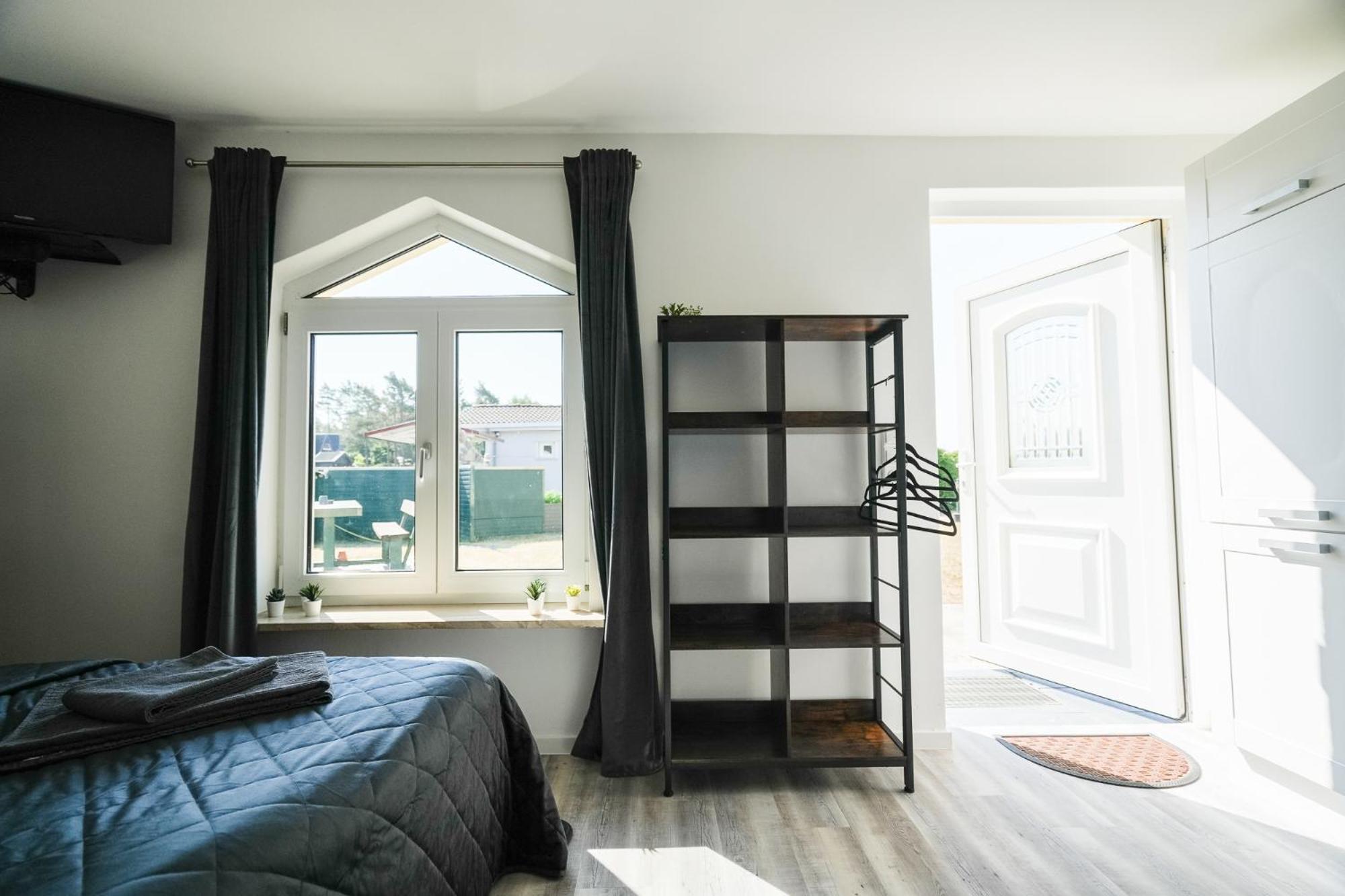 Black Tiger Seaside - Ferienwohnungen Direkt Am See Garden Room photo